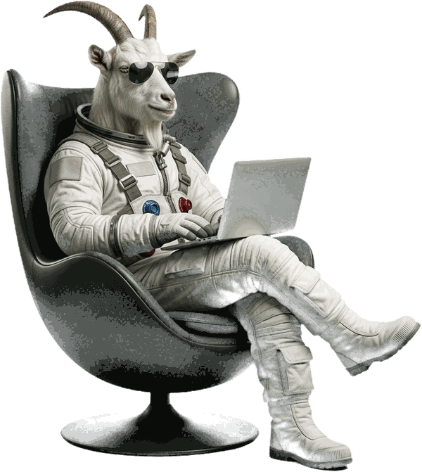 The AutSEO goat, sitting in a chair with a laptop